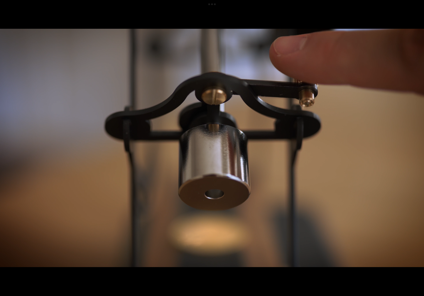 Guillotine release sets the cradle in motion 