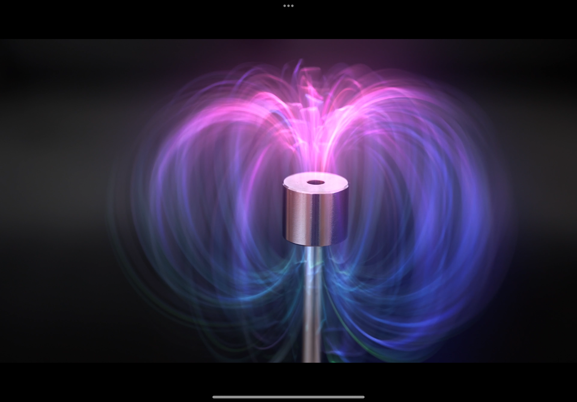 A strong magnet induces an measurable eddy current in the precious metal coin